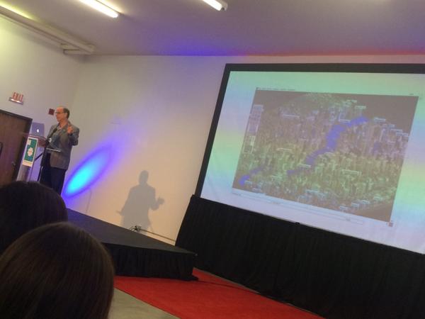 Not the best photo, but it's David Weinberger with an image of Sim City behind him so that's pretty awesome.
